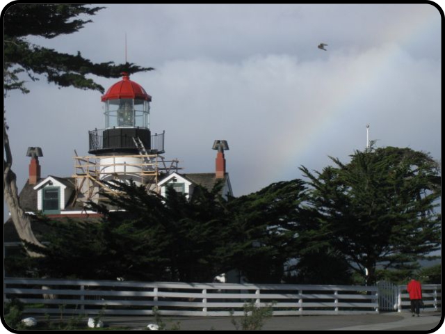 Rainbow over lighthouse grounds