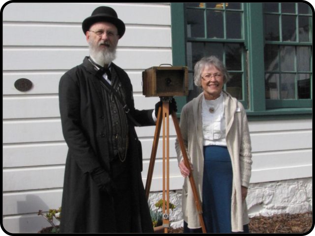 period photographer w/ docent in costume