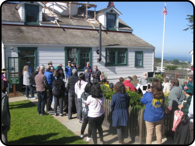 b-day visitors listening to proclamation that authorized building the lighthouse